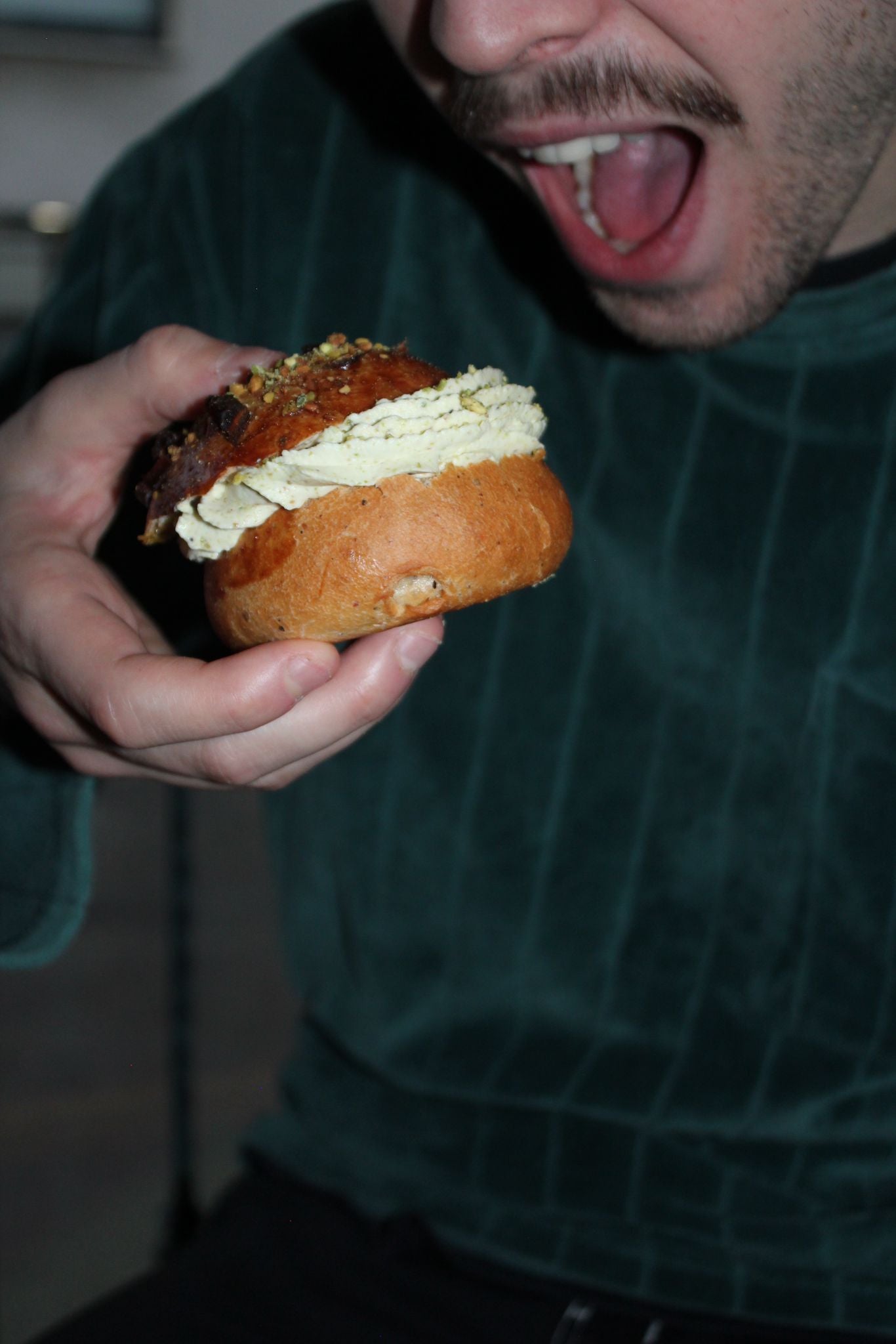 "Laskiaispulla" bun with pistachio whipped cream